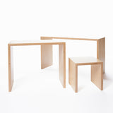 The Modular 12 Series. From back to front: large bench-desk, small bench-desk, and child’s stool. Cushions sold separately.