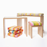 The Modular 12 Series.  From back to front:  large bench-desk, small bench-desk, and child’s stool.  Cushions sold separately.