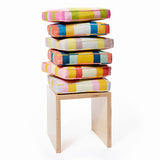 Cushions in Stripes. From top to bottom:  Dusky Garden, Sunshiny Day, Miami, Magic Hour, Surf Van, and Pond.