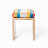 Child’s stool shown with Small Stripes cushion in Surf Van.